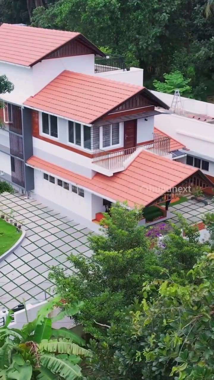 Traditional home

sloped fabricated roofs adorned with clay tiles and the charm of brick cladding pay homage to Kerala's architectural heritage.

Location: Muvattupuzha, Kerala

Credits: @buildnext.in

Kolo - India's Largest Home Construction Community

#residence #house #home #tropicalhouse #before&after #courtyard #staircase #home #keralahomes #budgethome #tropicalarchitecture #. #landscapedesign #insideoutside #spaces #instahomes #keralahomes #architecture #homedecor #interiordesign #house #indoorplants #greenhome #decor #artificialgrass