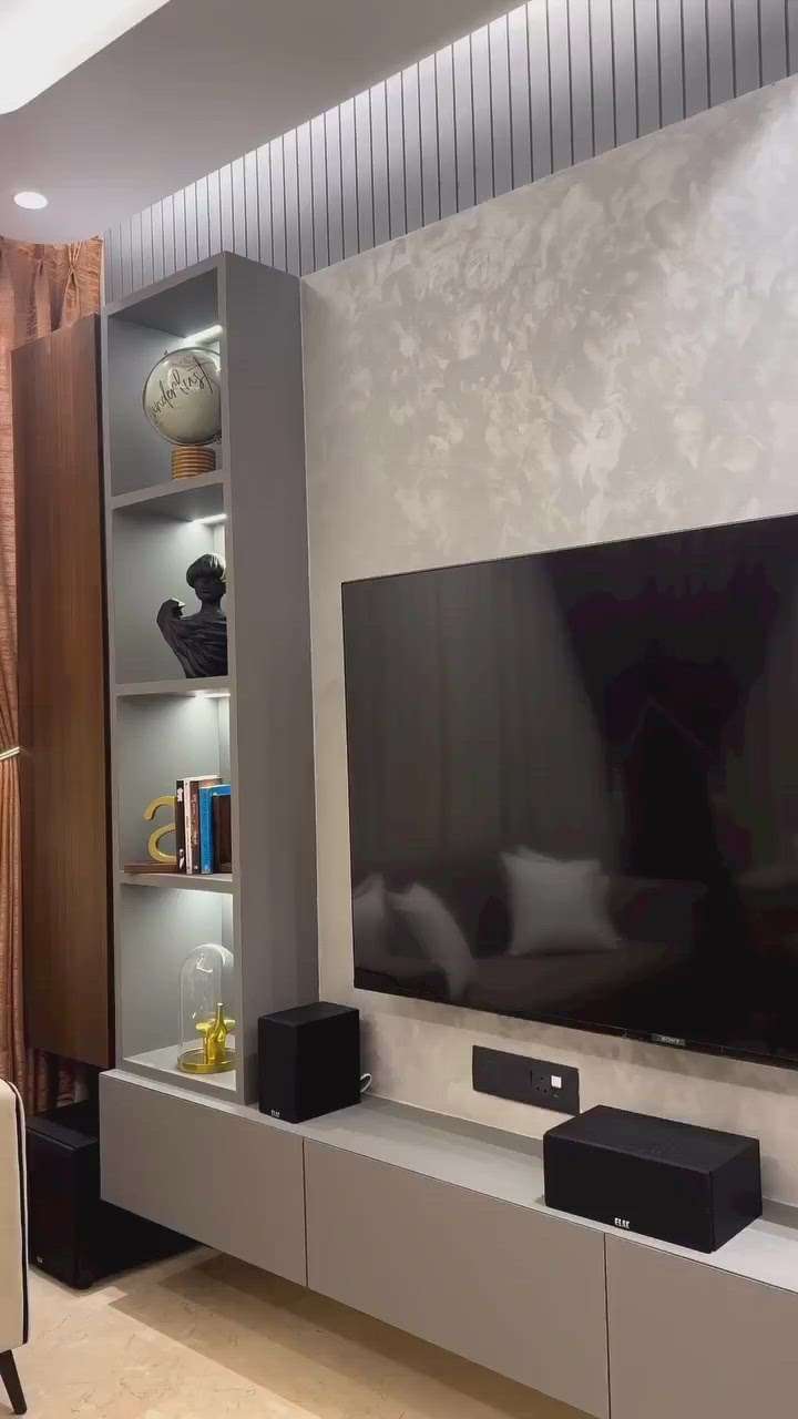 Tv Cabinet with draws underneath & Side shelf with focus lights Beautiful combination of mica
Opal Construction & Interior
Will make your house a living one - 8319099875

 #LivingRoomTVCabinet  #tvcabinetdesign  #LivingRoomSofa