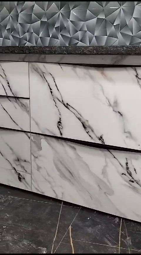 completed at indore 
material 18mm Hdhmr 1mm laminates Royal touch marble with edge 4mm handles