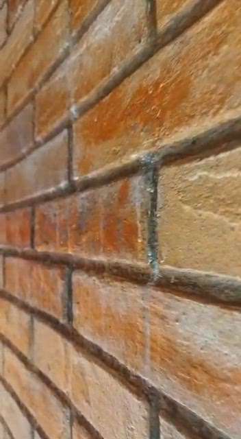 This is not an original brick.  The texture is made of old brick in putty.  Call 80.86.51.27.23 for all kinds of texture work #