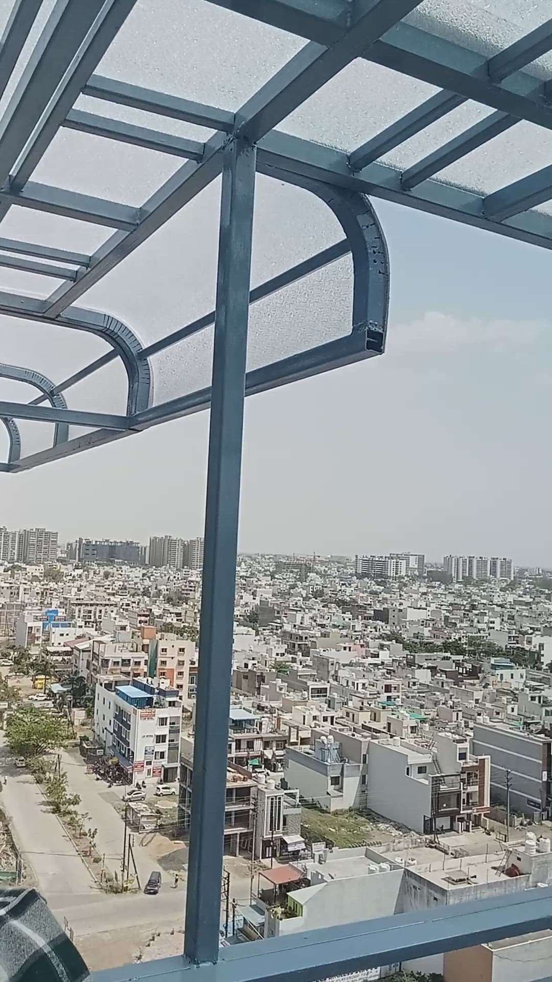 Bolcony shade with Polycarbonate sheet with TATA MS pipe on 13th floor at Elite Apex Mahalaxmi Nagar indore
