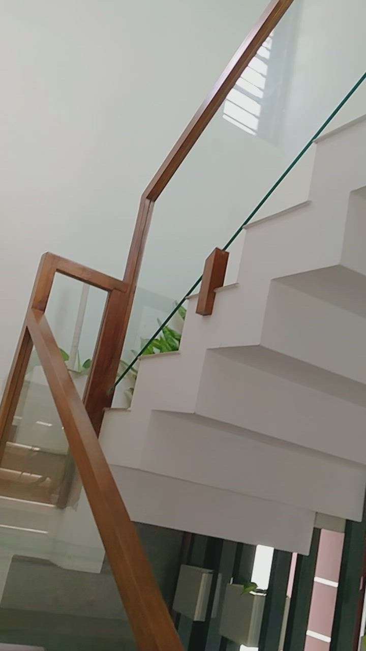 full wooden frame with glass handrail