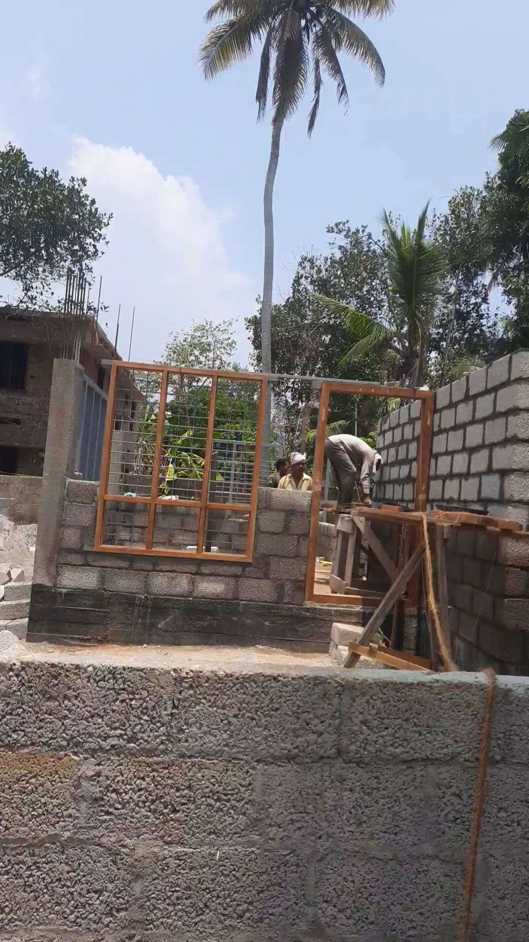 Wall blockwork & window installation  for a residentialbuilding @ Sreekariyam