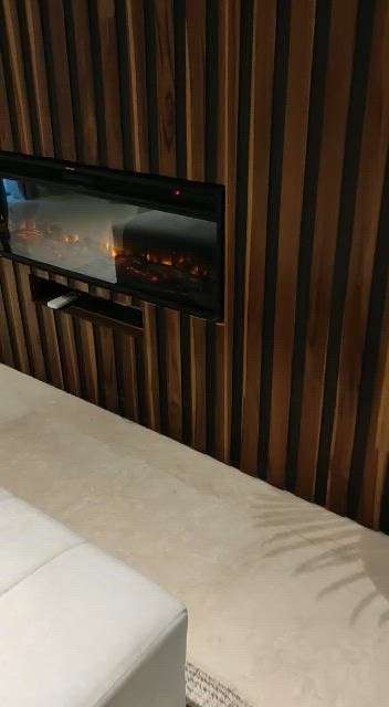TV cabinet and living room design.  #CelingLights #LivingroomDesigns #LivingRoomTVCabinet #Sofas #Contractor #KitchenIdeas #WallDecors #LivingRoomWallPaper #WindowsIdeas #dinning #GlassDoors #mirrorunit #ModularKitchen #plants