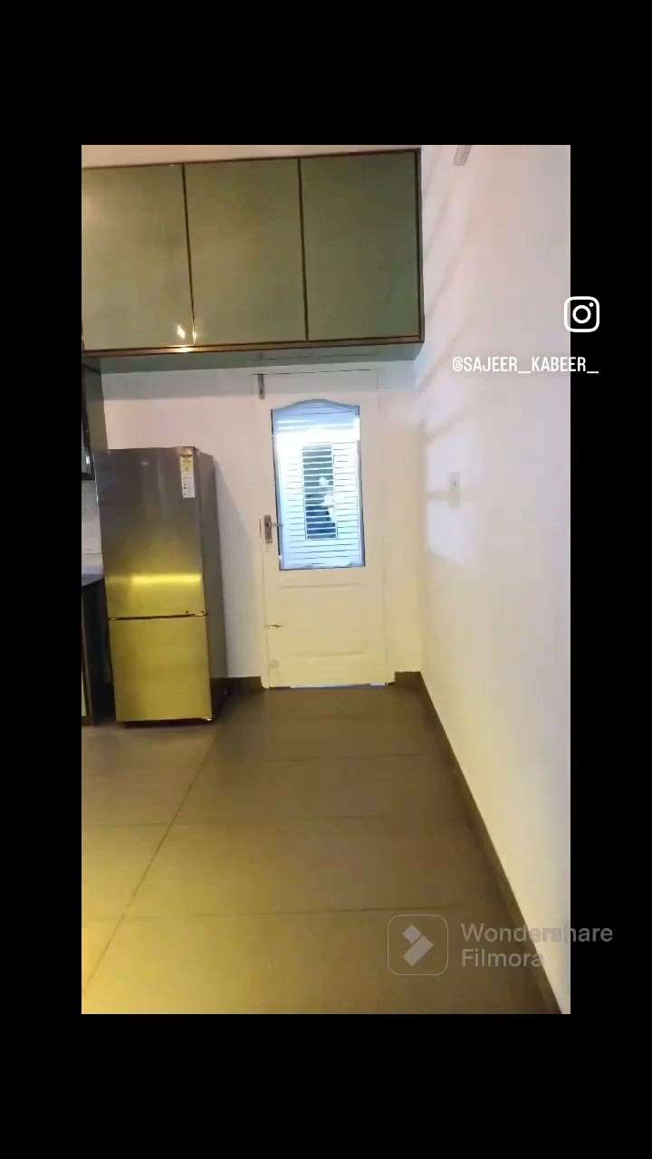 Light green modular kitchen cupboard.   #KitchenInterior #InteriorDesigner #HomeDecor #hometourmalayalam #instahome #koloviral #Contractor #architecturedesigns