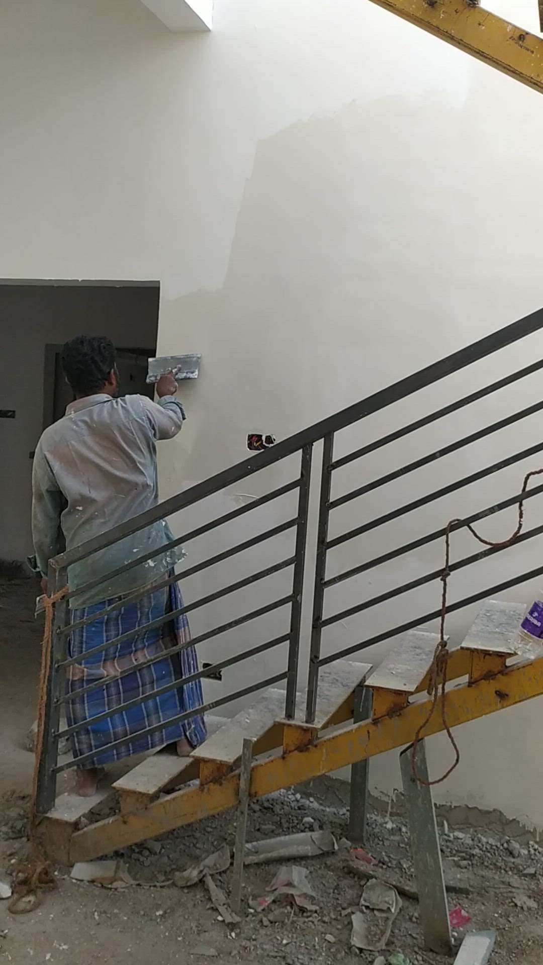 Putty 2nd coat
@pravachambalam site
#WallPutty 
#StaircaseDesigns 
#jkputty 
#qualityconstruction