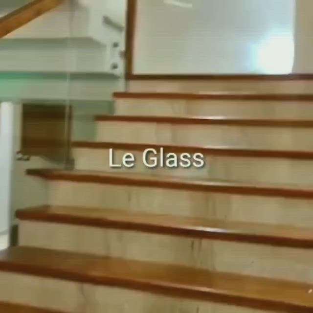 Glass with wooden handrail