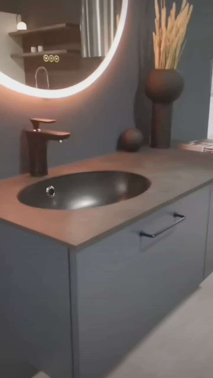 wash basin cabinet design nd mirror light design... #BathroomStorage  #BathroomDesigns  #vairal  #tending