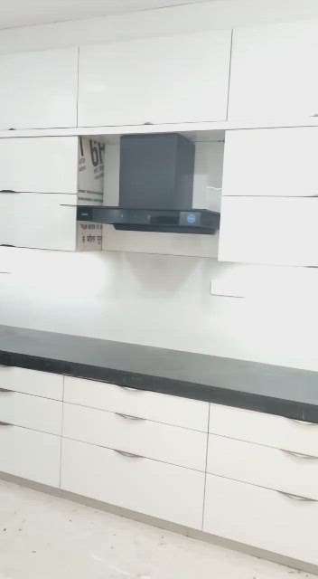 acrylic ultra modular kitchen in your budget
Dev Furnitures Indore.