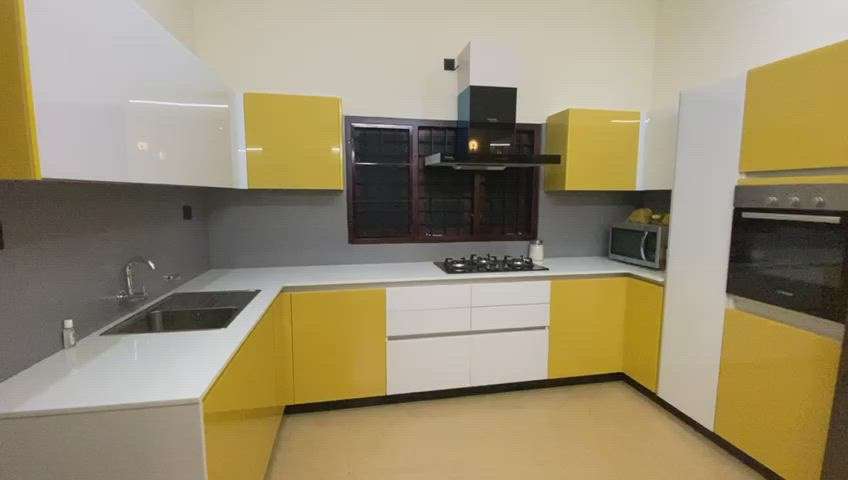 Lacquer glass modular kitchen
instyle interiors,Kochi
Ph : 98470 58490 
 #modernmakers
 #newtrend
Rs.2590/- Sq.ft. approx.