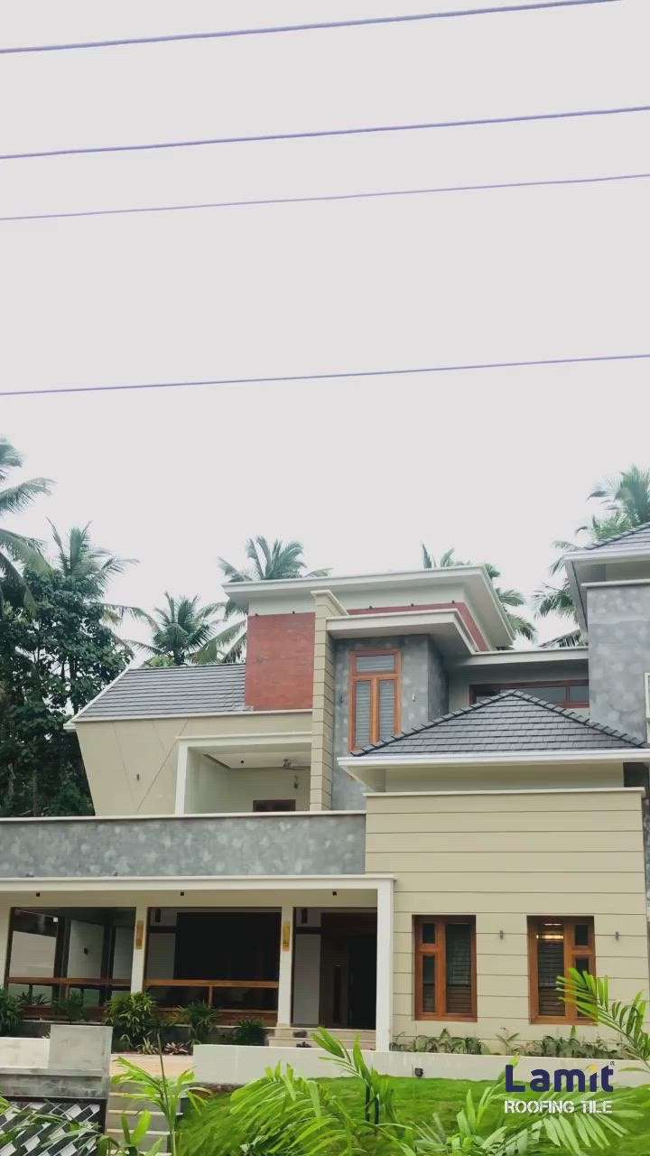 Finished Project at Nadapuram

Lamit Piano Edge
German Series  #rooftiles
#RoofingIdeas
#FlatRoof #RoofingDesigns #SteelRoofing