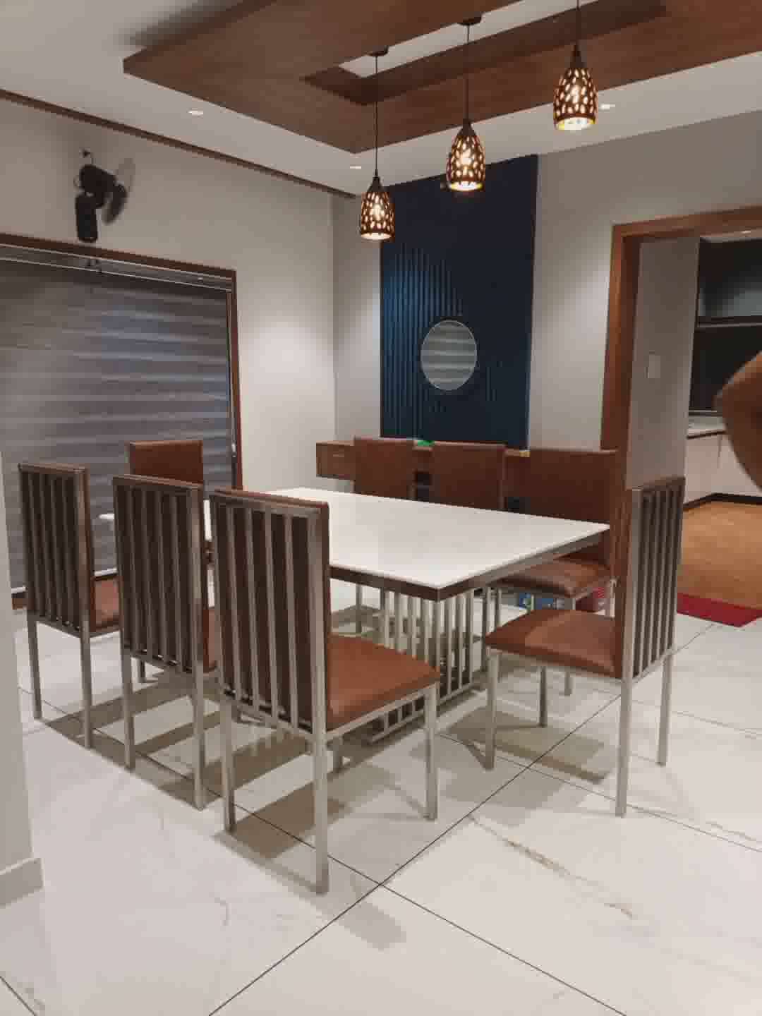 8 seater dinning table free delivery any where in kerala 304, 18gauge stainless steel, nano white artificial granite, italian model dinning chair available #stainless #StainlessSteelfurniture #stainless-steel #furnitures #DiningChairs #DiningTable