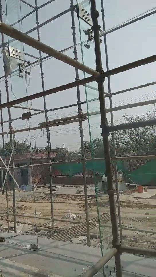Spider Glazing installation in Noida sector 83.

#GlassDoors #GlassBalconyRailing #GlassHandRailStaircase #WindowGlass #glasswindows #glasspaneling #Toughened_Glass #upvcfabrication