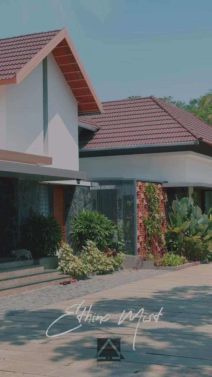 #tropicalhouse #architecturedesigns #kerala_architecture #ContemporaryHouse #SlopingRoofHouse #interiordesign  #Landscape
