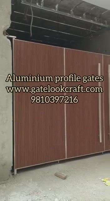 Aluminium profile gate by Hibza sterling interiors Pvt Ltd #delhi #gurgaon #ghaziabad #faridabad #noida #sonipat #gatelookcraft #aluminiumprofilegate 
#profilegates #maingates #gatedesing
#fancygate #aluminiumgates
#housegate