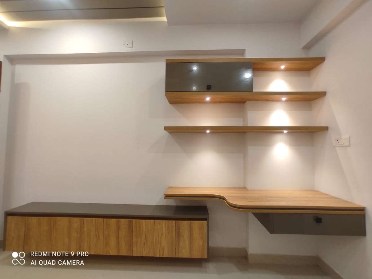 Lighting, Storage Designs by Interior Designer CABINET stories 9495011585, Thrissur | Kolo