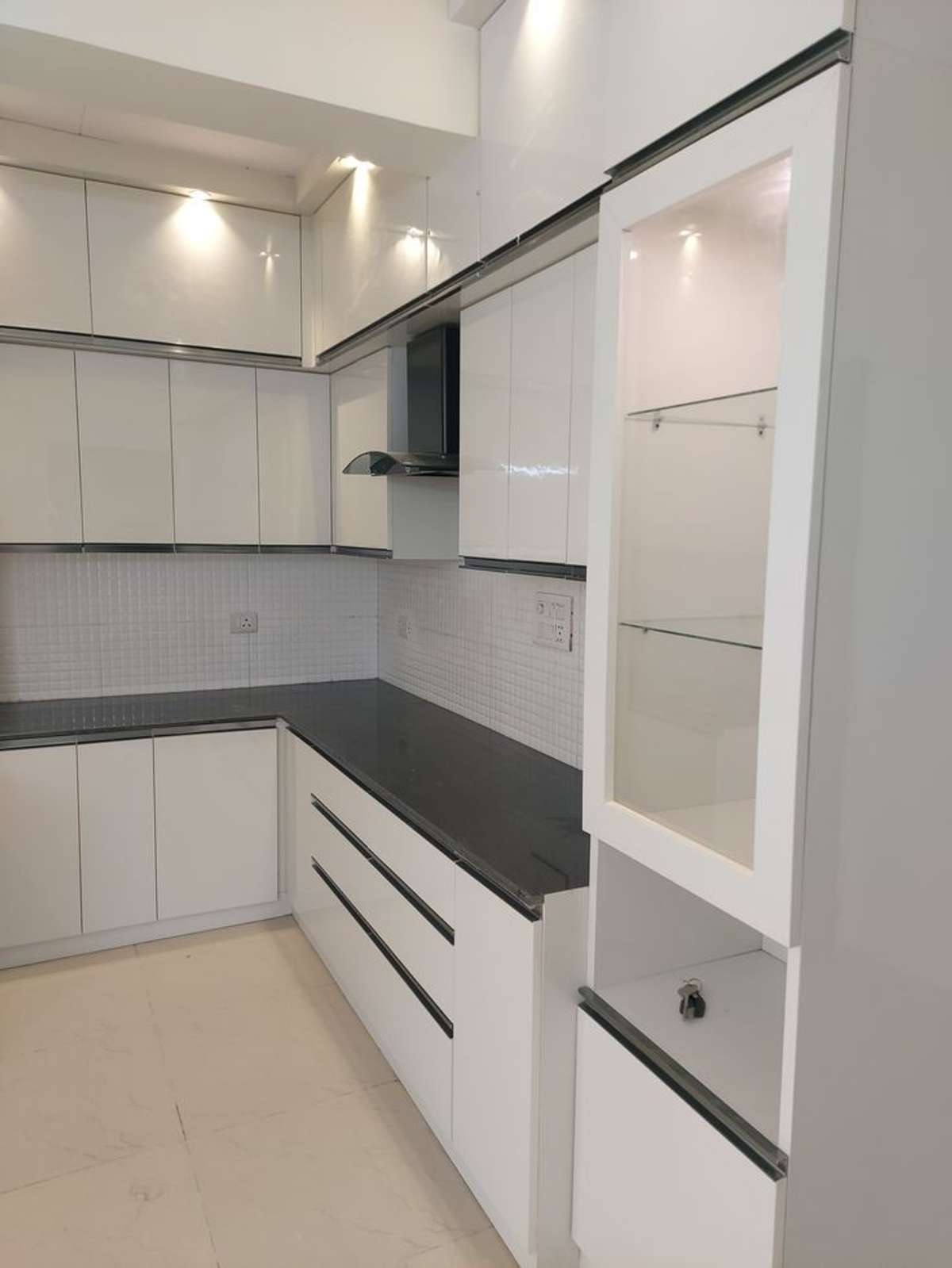 Kitchen, Lighting, Storage Designs by Interior Designer Dream decor Design, Kozhikode | Kolo