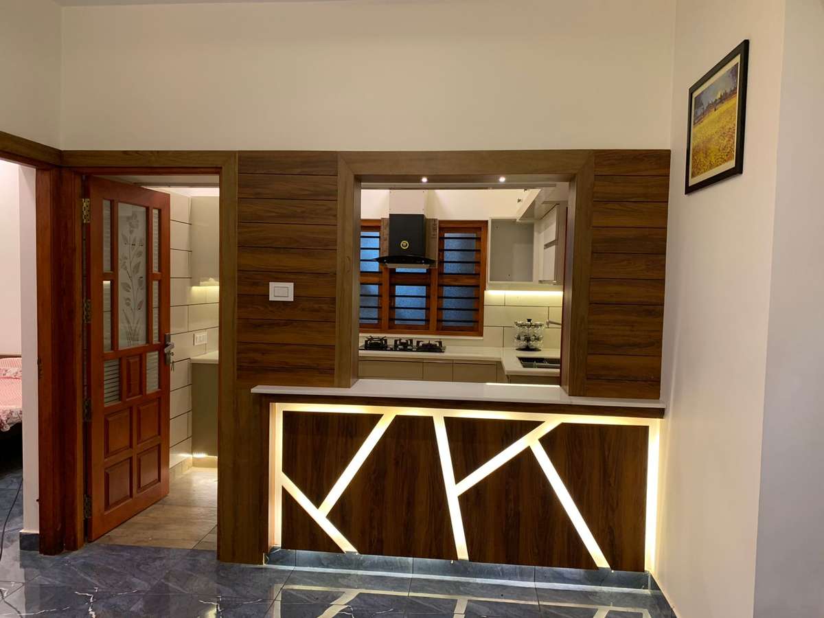 Kitchen, Lighting, Storage Designs by Contractor Cadillac interiors, Kozhikode | Kolo
