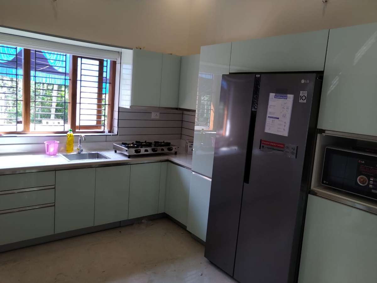 Kitchen, Lighting, Storage Designs by Interior Designer De arch interior, Kozhikode | Kolo