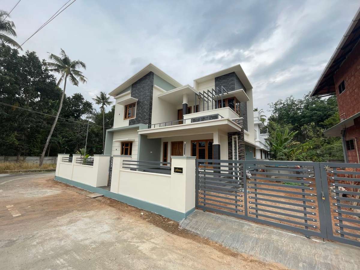 Designs by Contractor Global Housing, Thrissur | Kolo