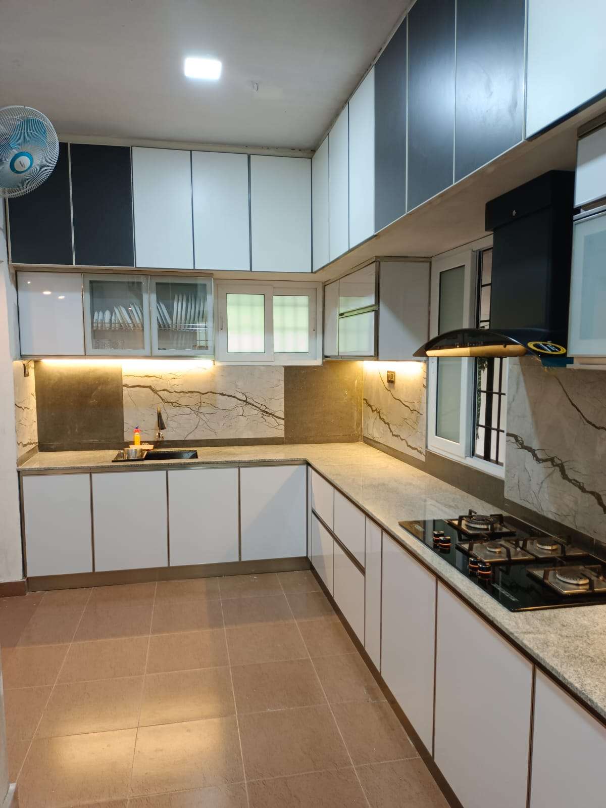 Storage, Lighting, Kitchen Designs by Interior Designer FABZZINDIA DESIGN interior, Kottayam | Kolo