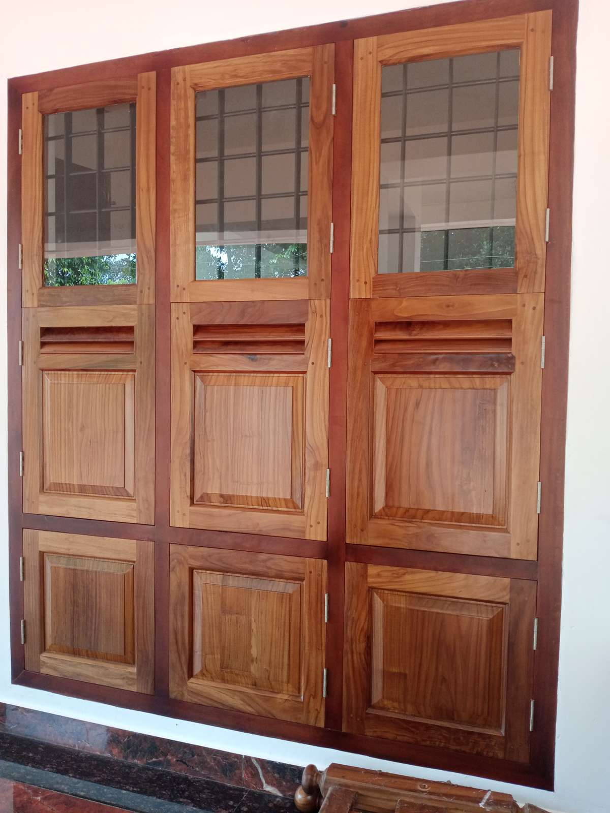 wooden window designs in kerala