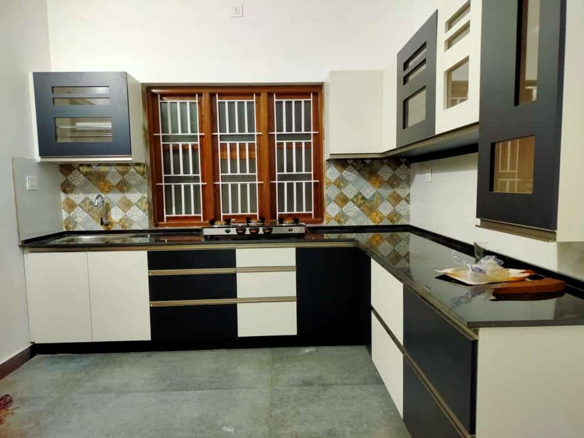 Kitchen, Storage Designs by Building Supplies Kallunkal Interiors