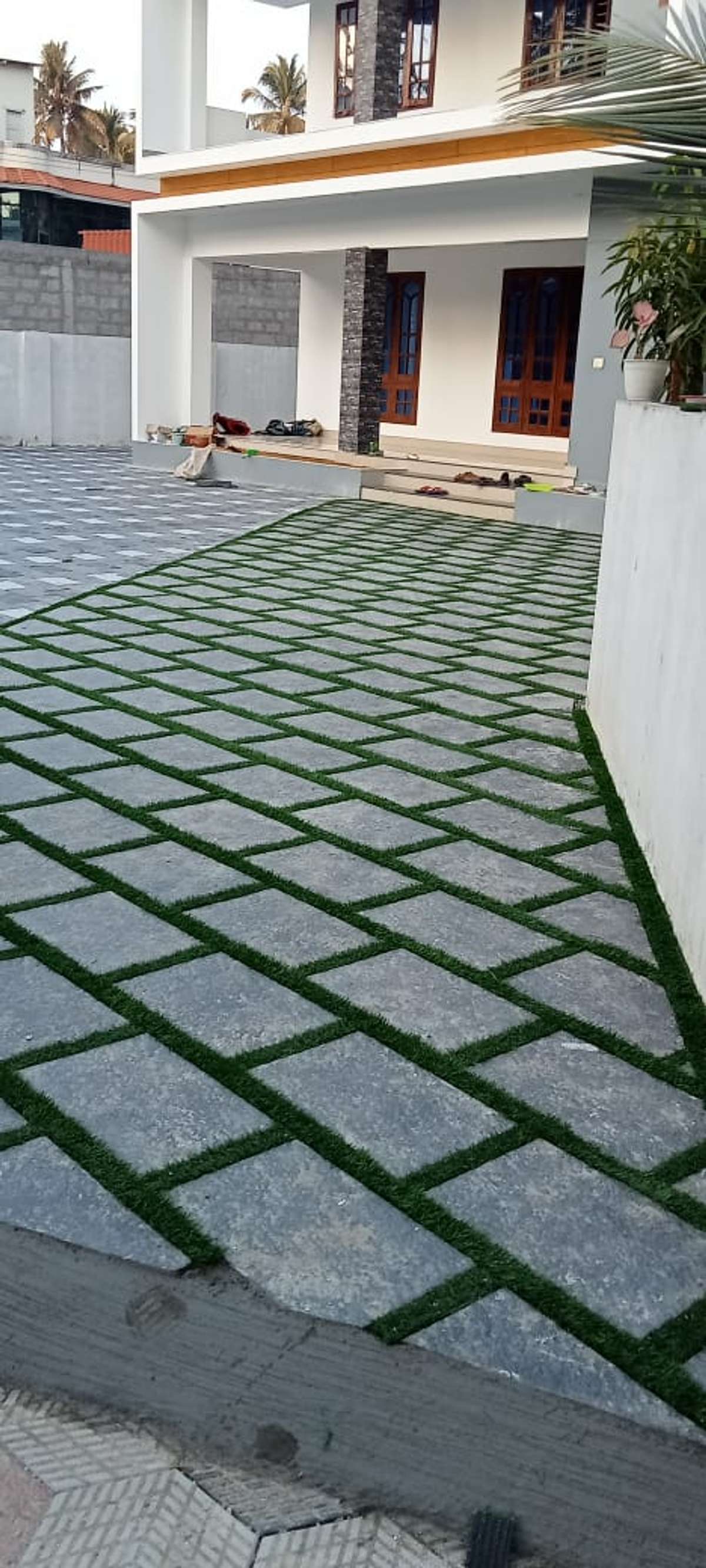Designs by Building Supplies Anamika interlock and natural stone, Thiruvananthapuram | Kolo