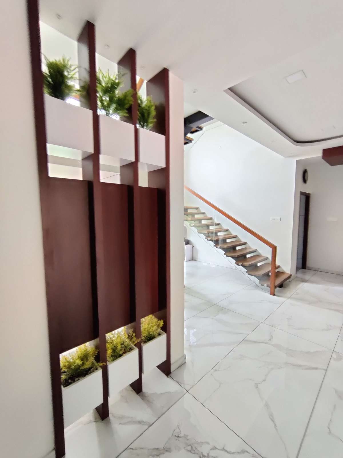 Wall, Staircase Designs by Interior Designer Uwais Aliparambil, Malappuram | Kolo