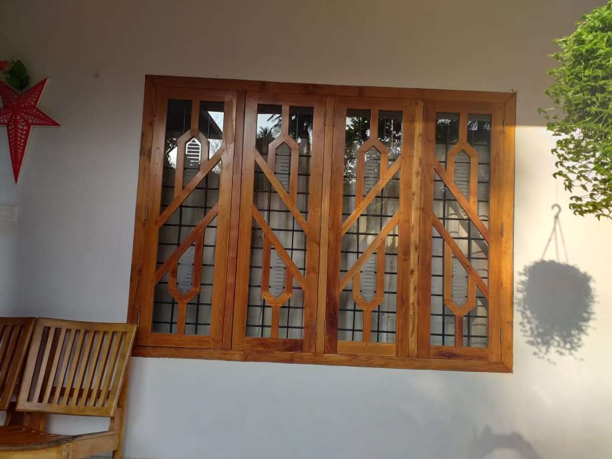 wooden window designs in kerala