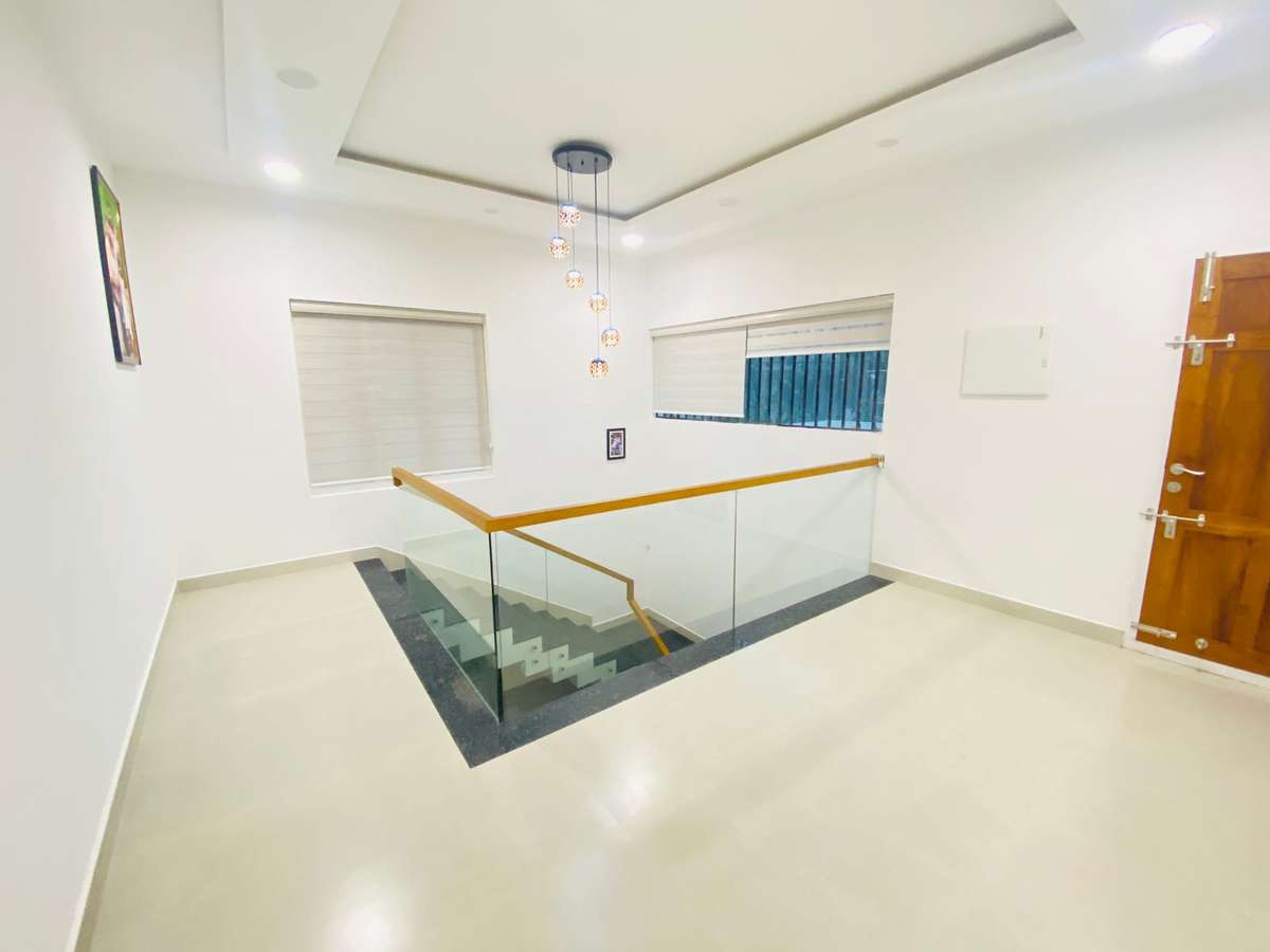 Flooring, Prayer Room, Storage Designs by Contractor Happiness Projects Builders  Developers, Ernakulam | Kolo