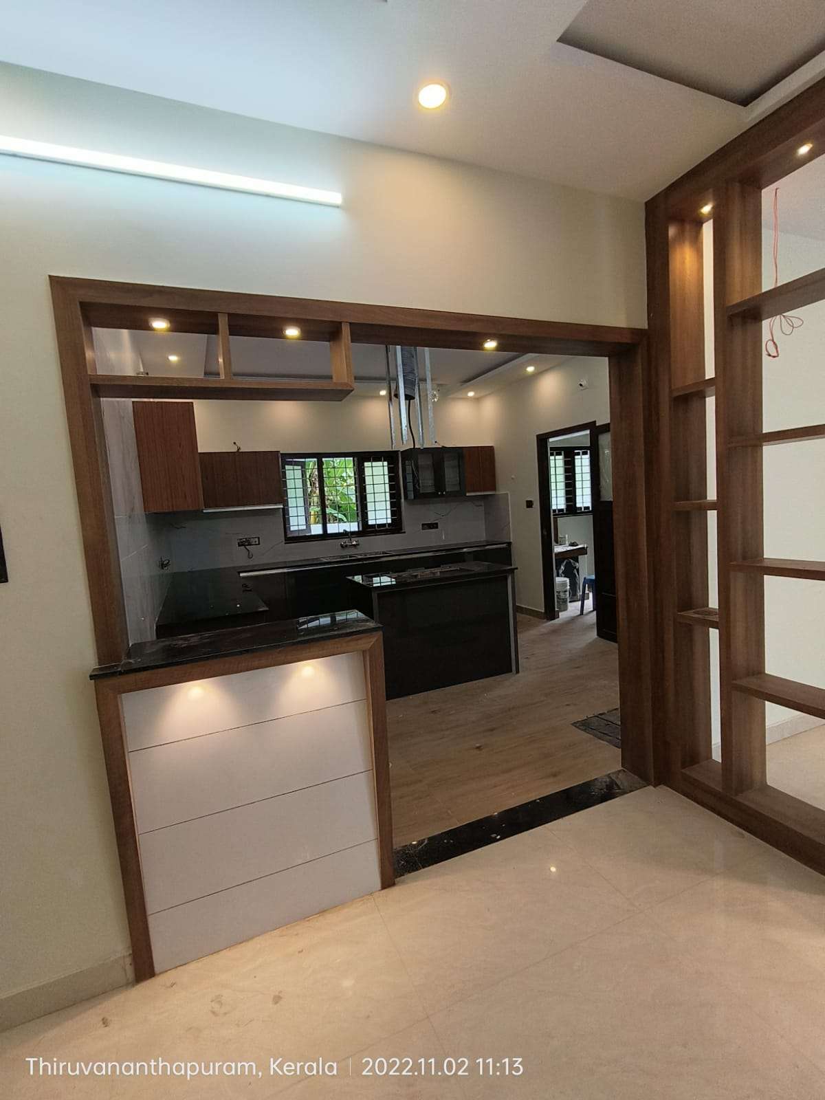 Ceiling, Kitchen, Lighting, Storage Designs by Building Supplies A to Z Builders Developers, Thiruvananthapuram | Kolo