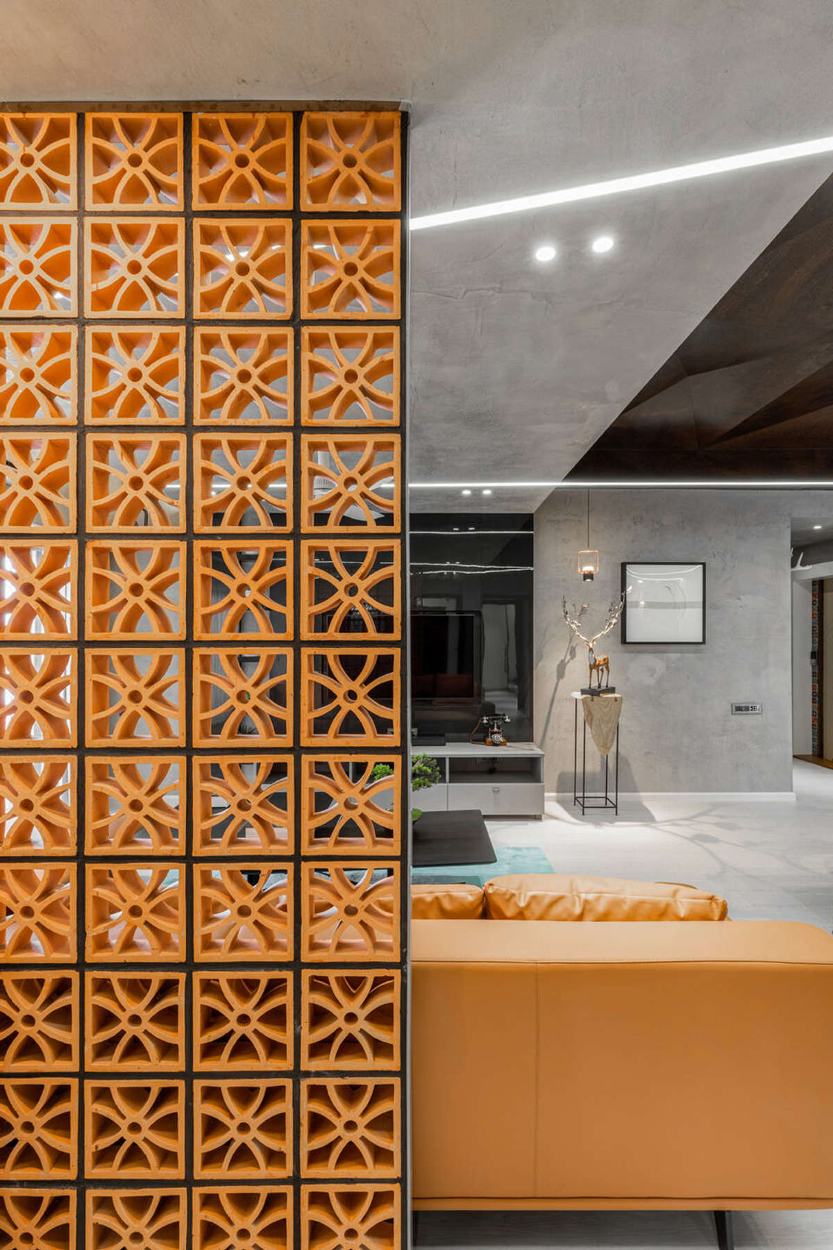 Terracotta Jaali work is a good option.In fiber meterial also available. Can be painted suitable for your interior.