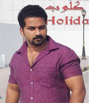 Nidhish T