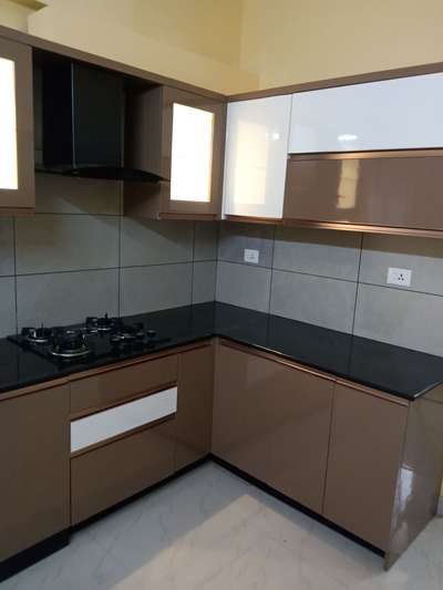we are Modular kitchen installers we do this all over Kerala m 9846012358,