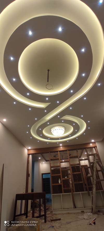 350 sq ft living room false ceiling design #kayamkulam 
with veneer partition
for budget interiors
pH: 9633147651
 #Architectural&Interior  #kochiindia  #Alappuzha  #KeralaStyleHouse  #ContemporaryDesigns  #budget_home_simple_interi  #Modularfurniture