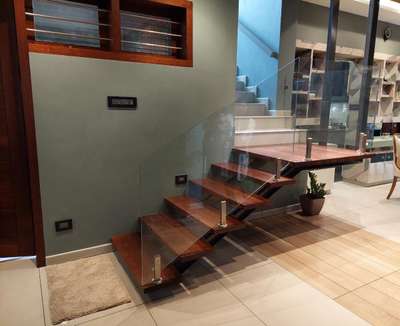 #WoodenStaircase #woodenfinish #woodendesign  #Toughened_Glass