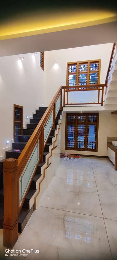 wooden handrails with glass.