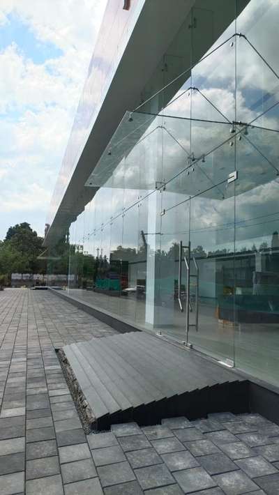 Commercial buildings Front facades and interior partition for offices.  #Front facades  #Double_Glaze_glass  #Laminated glass # sound proof glass # spider Glazing