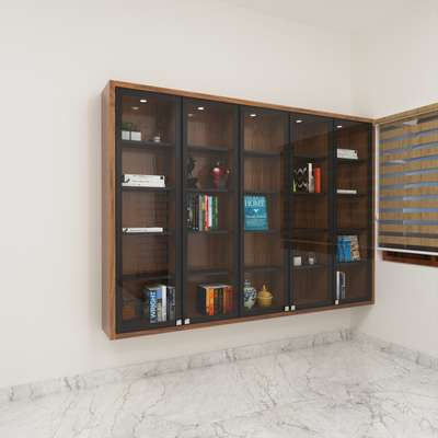 Book Shelf - Home Library Area 
Client : Mr. Koshy Mathew
Haripad
Material : 710 BWP Marine Ply 16mm, 1mm Greenlam Laminates, Rehau Edgeband 22*0.8, Black Aluminium Door Glass shutter
AiA - Amazing Interiors & Architecture, Alappuzha, Kerala. one of the Fabulous Interior design company  in Kerala (Alappuzha). You can consult me for any kind of creative ideas and designs and Own factory products. Follow me on 
Insta : @iam_dream_traveller
Facebook : Amazing Interiors & Architecture 
Modular Home Interior Designs. 
>3000+ shades (Laminates)
>710 BWP Gurjan Marine Plywood 
>2000+ Louvers Charcoal Panel designs.
>Customised Requirements.
>Branded accessories & Material.
>100% Machine Made Units.
>Factory Manufacturing.
>15 Years Warranty.
>Quality Work & Best Finishing. 
For more Details Contact me 
Check this portfolio George Niju 
https://koloapp.in/pro/niju-george
#Niju_george #bringamazinginside #interiordesigner #interiordesign #HomeDecor  #koloapp