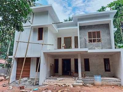 finishing stage . Home  #malappuram #modernhome  #modernelevation  #ContemporaryDesigns  #tile cladding #stone_cladding