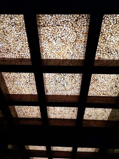 # R S Interior & Designer
lobby false ceiling with designer glass