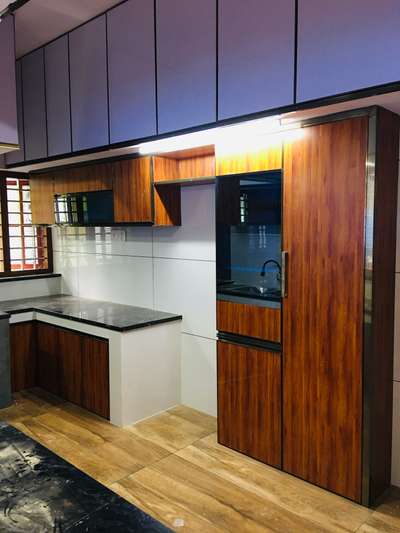 tall unit kitchen designs  #ModularKitchen  #modularkitchenkerala  #KitchenIdeas  #tallunit  #OpenKitchnen  #aluminiumkitchan  #LivingroomDesigns  #KitchenInterior  #budgethomes  #budgetkitchen