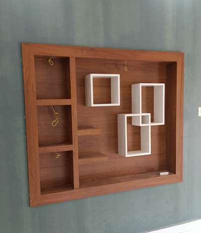 #wall showcase.... plywood and mica finished..