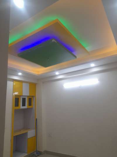 study room with study table and fall ceiling