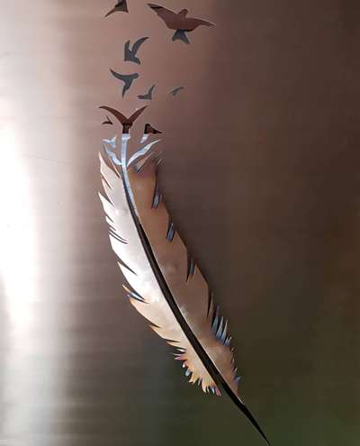 Laser cut decorative  wall art on SS metal with pvd coating.