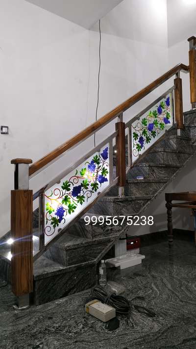 #wooden  #SS  #Colouredglass  #handrail  #ss handrail  #wooden  handrail  #glass work #stainless steel design  #teak wood stair