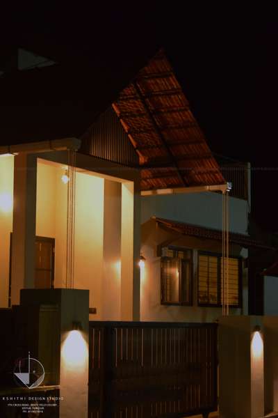 Residence at Thrissur 
 #TraditionalHouse  #BalconyLighting  #SlopingRoofHouse  #warmlights #athangudi  #welldesignes  #colors  #SmallHouse
