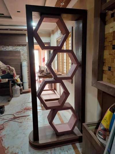 #InteriorDesigner  #partitionwall  #withaxagonaldesign
.
.
  #woodenworks 
.
.
.
 #almirahdesign   #moderndesign  
 #modernalmirahdesign