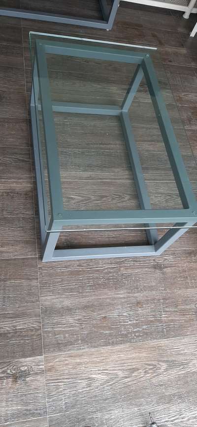 glass table with matel cotted